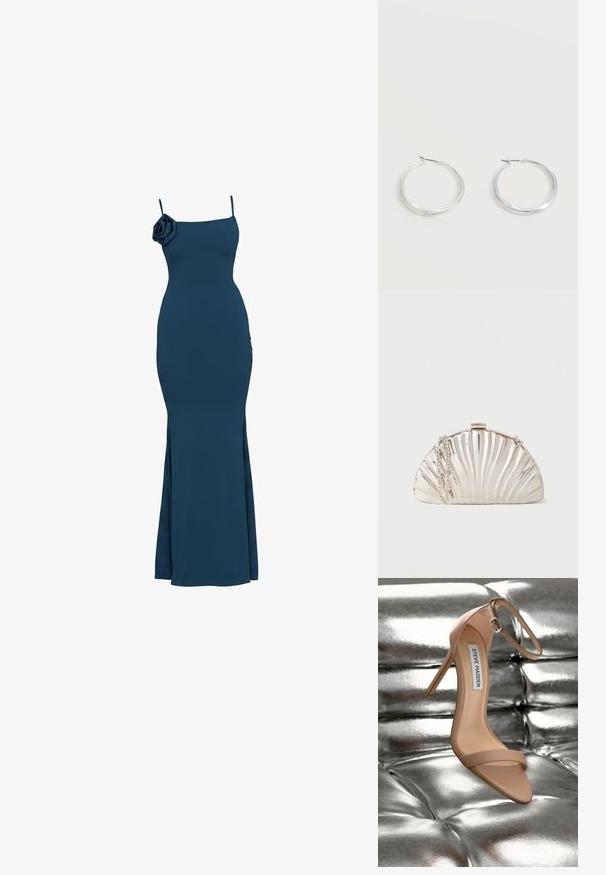 Robe bleu marine longue jusqu'au sol sans manches avec fines bretelles et détail d'une fleur en tissu sur l'épaule gauche, silhouette ajustée.; Sandale à talons hauts nude avec une bride à la cheville et une texture lisse et brillante, posée sur un fond en argent métallique capitonné.; Pochette argentée métallique en forme de coquillage, avec une chaîne en argent drapée sur le côté.; Boucles d’oreilles créoles en métal argenté avec une surface lisse légèrement incurvée et des fermoirs à clapet sur un fond blanc uni.