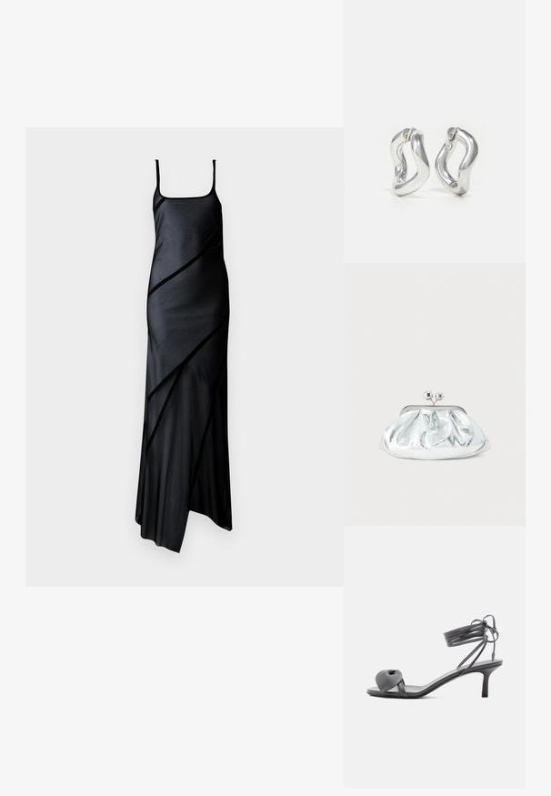 Sort satin kjole med tynde stropper, der har en tætsiddende krop og asymmetrisk kant, fremhævet med diagonale gennemsigtige paneler.; Grå læder sandal med hæl, knyttet rem ved tæerne og snørebånd, der vikles om anklen, på slank mellemhøj hæl mod hvid baggrund.; Lille sølvfarvet metallisk clutch-pung med rundet, rynket design og lukning med to sølvkugler.; Sølv øreringe i hoop-design med snoet mønster. Runde kanter og blank finish. Åbne lukninger for nem brug. Glat tekstur over det hele.