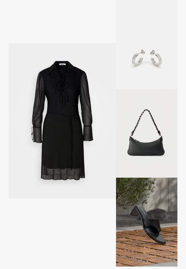 Schwarzes Kleid mit langen, transparenten Ärmeln, einem gebundenen Kragen und einer taillierten Taille. Verfügt über ein einfarbiges Material und eine fließende Silhouette.; Schwarze Calvin Klein Sandale mit Absatz und Zehenschlaufe auf einem Holzkachelfußboden im Freien neben einem Baum und einer Steinmauer.; Schwarze Lederschultertasche mit gewölbter rechteckiger Form, goldener Kette, die in den geflochtenen schwarzen Riemen eingewebt ist, und Reißverschlussverschluss oben.; Silberne Metall-Hoops mit strukturiertem Design, ausgestattet mit einem kleinen Steckverschluss und Branding an einem Hoop. Abgerundete Form mit glänzender Oberfläche.