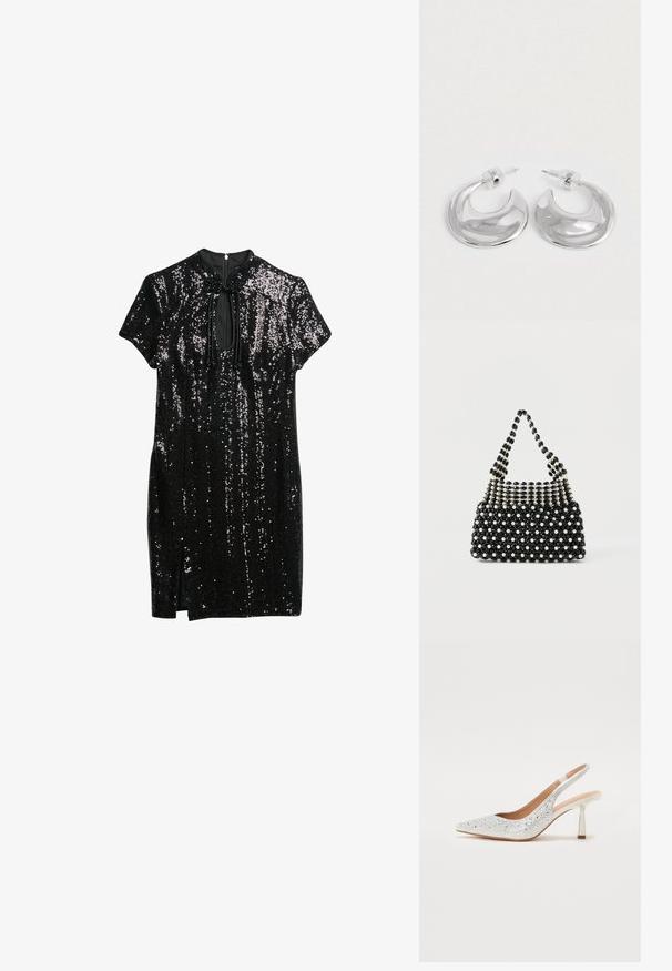 Zwarte jurk versierd met pailletten, met een hoge halslijn, korte mouwen en een sleufdetail aan de voorkant, met een lichte split aan de onderrand.; Zilveren slingback hoge hak schoenen met een spitse neus, versierd met rhinestones, met een metallic hak en een soepele binnenkant.; Zwart-witte met kralen versierde handtas met een kort hengsel, voorzien van afwisselend parelachtige en zwarte gefacetteerde kralen in een geruit patroon.; Een paar gepolijste zilveren halve maanvormige creolen met heldere plastic achterkanten op een witte ondergrond.
