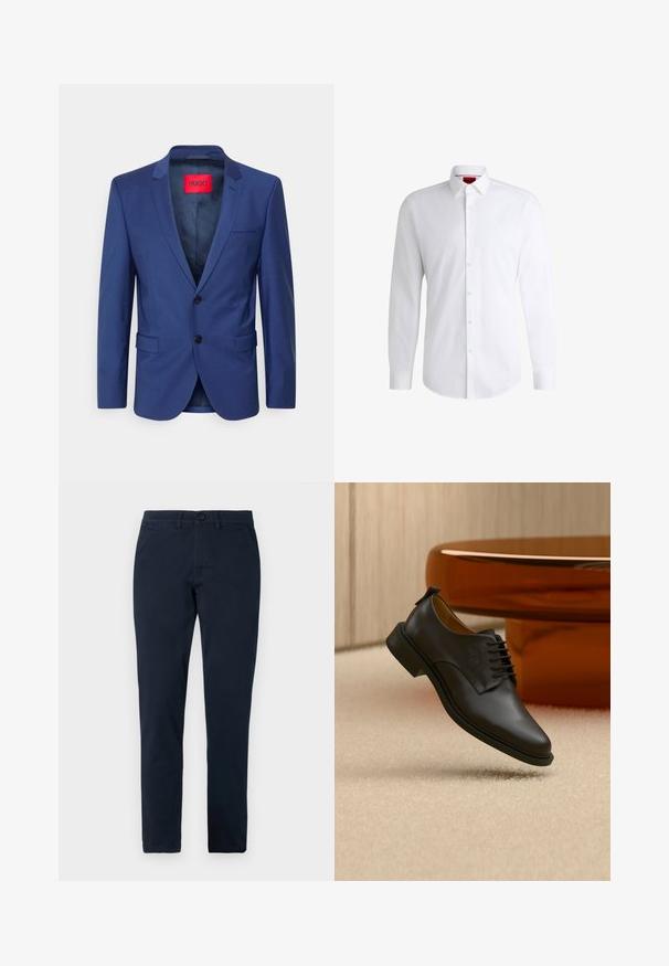 Chaqueta de traje azul marino con solapas en punta, dos botones y bolsillos con tapa. Presenta una etiqueta de marca roja en el interior, con una textura suave en toda la prenda.; Camisa blanca de botones, confeccionada en tela suave, con collar clásico, mangas largas y dobladillo curvado. Presenta botones beige en la parte delantera.; Pantalones negros de corte ajustado para hombre con cierre frontal de botón y cremallera, trabillas para cinturón y bolsillos laterales.; Zapato de vestir para hombre de cuero negro con cordones flotando sobre una alfombra beige, con una mesa de café redonda marrón en el fondo.