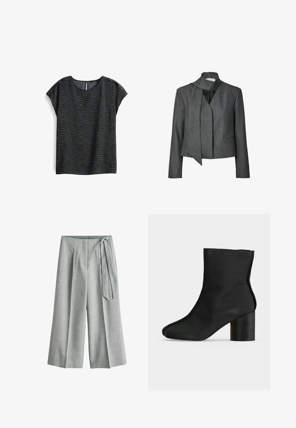 Donkergrijze damesblazer met lange mouwen en een aangehechte sjaalachtige kraag, cropped lengte en twee voorzakken met openingen.; Donkere blouse met een patroon, voorzien van een ronde halslijn, korte mouwen en een subtiele textuur met een abstract ontwerp in tinten groen en grijs.; Lichtgrijze wijd uitlopende cropped broek met een zijstrikdetail, een platte voorkant en een subtiele gestructureerde stof.; Zwarte enkellaars met een afgeronde neus en een stevige, middelhoog hak op een witte achtergrond.