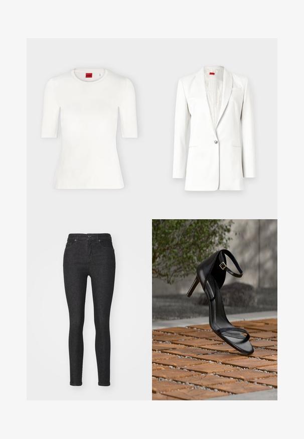 Blazer blanc avec une fermeture à bouton unique, des revers et une texture subtile. Comprend un détail de pochette et un revêtement intérieur satiné.; T-shirt blanc ajusté à manches courtes avec col rond et étiquette de marque rouge à l'intérieur du col.; Jean skinny en denim noir avec une coupe ajustée, design classique à cinq poches, fermeture à bouton à l'avant et détails de couture subtils.; Sandale noire à talon haut avec sangle à la cheville, suspendue au-dessus d'un sol en carreaux de bois à l'extérieur, avec un arrière-plan flou de verdure et de pierre.