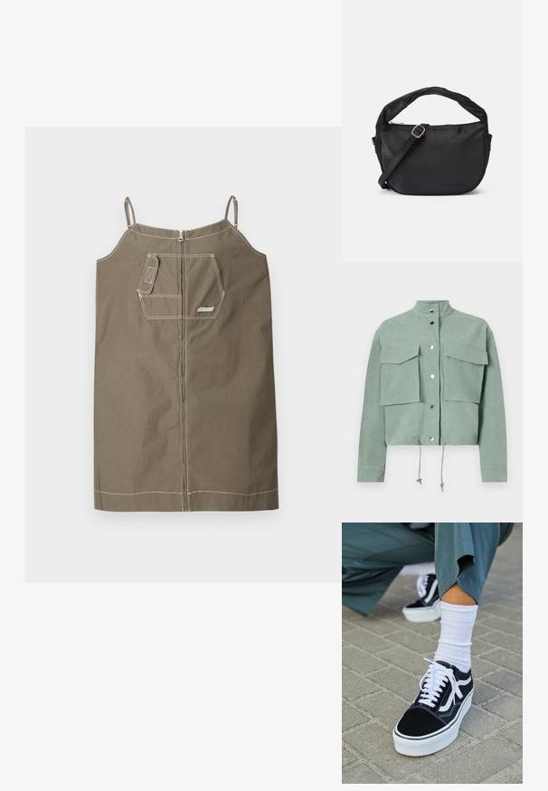 Korte mouwen, cropped, groene jas met twee voorzakken en drukknoopsluitingen, met trekkoorden aan de zoom en een opstaande kraag.; Olijfgroene mouwloze jurk van katoen met een ritsluiting. Heeft een enkele borstzak, contrasterende stiksels en verstelbare bandjes.; Zwarte suède sneaker met witte accenten en veters, uitgerust met een dikke witte zool en contrasterende stiksels, gecombineerd met een witte sok.; Zwarte stoffen schoudertas met een gedraaide handgreep, een afneembare schouderband en een ritssluiting aan de bovenkant. Gladde textuur en minimalistisch design.