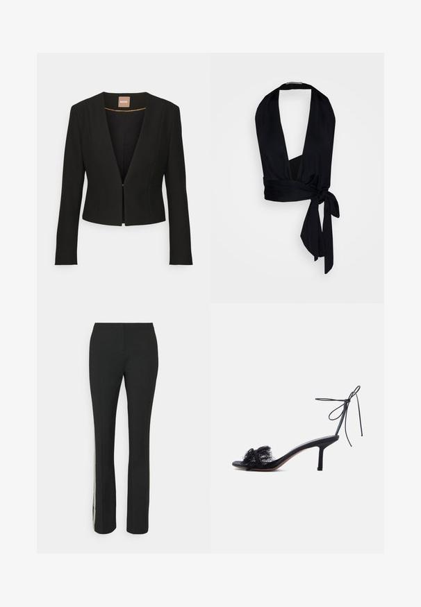 Blazer negro cortado con un profundo escote en V, mangas largas y un único cierre frontal. Hecho de una tela suave y resistente con un brillo sutil.; Ioannes WRAP VEST - Top - black; Pantalones negros con un diseño de pierna recta, que cuentan con un panel lateral texturizado, creando un contraste con la tela suave de los pantalones.; Sandalia negra de tacón alto y punta abierta con tira que se ata al tobillo y detalles de encaje en la banda frontal sobre un fondo liso claro.