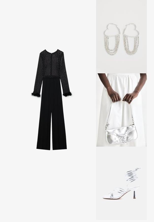 Zwarte jumpsuit met lange mouwen, versierde lijf met kristallen en pluizige accenten op de manchetten. Wijde pijpen, slanke silhouet.; Zilveren sandaal met hoge hakken en fijne bandjes die over de tenen kruisen en een spiraalvormige wikkel rond de enkel, op een witte achtergrond.; Zilveren metalen handtas met vetersluiting, met een strak ontwerp en een korte schouderriem. De tas wordt vastgehouden in de handen, waardoor de textuur goed tot zijn recht komt.; Zilveren oorringen in de vorm van een hart, versierd met watervalletjes van heldere rhinestones voor extra sprankeling en textuur.
