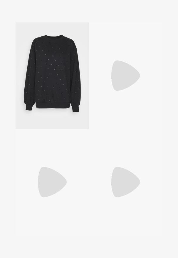 Gina Tricot Sweater - offblack; Anna Field Longsleeve - white; Lichtgrijze katoenen trainingsbroeken met een elastische tailleband en een trekkoord, rechte pijpen, zonder zichtbare logo's of patronen.; Zwarte leren instapschoen met franjes, dikke zool en een textuurrijke afwerking, geplaatst op een blauw gestructureerd tapijt.