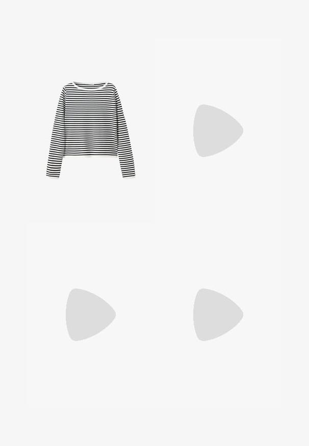 Chemise à manches longues avec des rayures horizontales noires et blanches et un col rond sur un fond blanc uni.; Haut dos nu vert avec bordure jaune, texte "BRASIL" et fleurs tropicales jaunes et blanches en bas à gauche.; Pantalon blanc ample avec taille élastique, cordon de serrage et poignets élastiqués froncés aux chevilles.; Jambes vêtues d’un pantalon slim noir avec des fentes à l’avant de l’ourlet, assorties à des chaussures plates Mary Jane noires avec une petite bride à boucle.