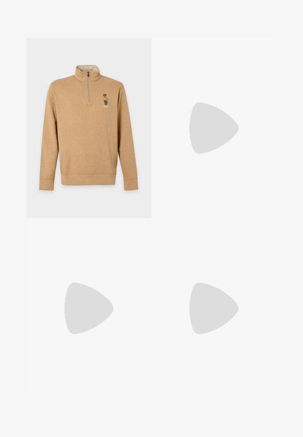 Beige long-sleeve pullover with a quarter zip and embroidered bear wearing a hat and jacket with the word "Polo" on the chest.; Long-sleeve button-up shirt with red, blue, and white plaid pattern and a small embroidered logo on the left chest pocket area.; Rust-colored corduroy pants with front pockets, belt loops, and a button closure, laid flat on a light background.; White leather sneaker with a smooth texture, featuring a perforated toe, lace closure, and embroidered logo on the side. White rubber sole.