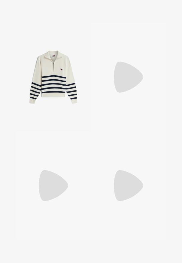 Kremstrikket pullover med kvart lynlås, marineblå vandrette striber på krop og ærmer og et lille logo på venstre bryst.; Hvid kortærmet skjorte med rød kant, "CANADA" tekst, canadisk flag og "Levi Strauss California" logo foran.; Blå højttaljede denimjeans med vide ben, forlommer, bæltestropper og knaplukning, vist på en hvid baggrund.; Sorte læder loafers med spidse tå, lille blokhæl og guldfarvet hardware detaljer foran. Glat tekstur og minimalistisk design.