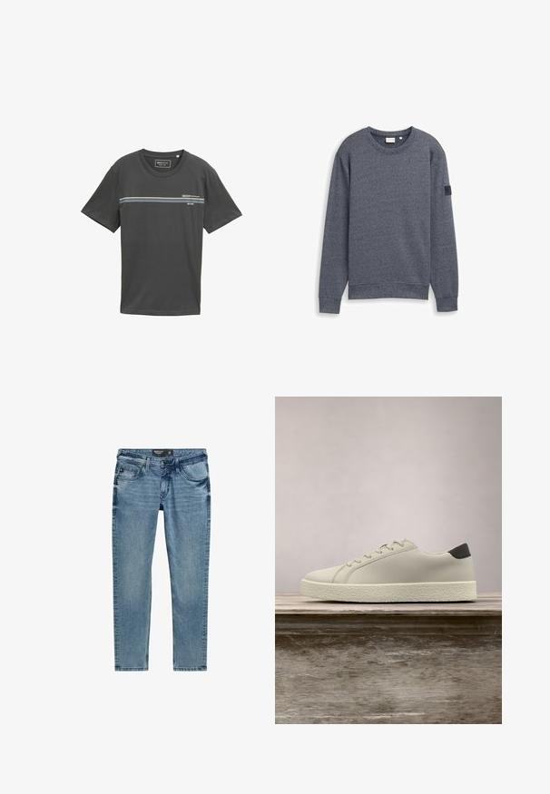 Grå langærmet sweatshirt lavet af tekstureret stof med rund hals og ribbede manchetter. Har et minimalistisk design uden udsmykninger.; Grå bomulds T-shirt med korte ærmer, rund hals, med vandrette striber i blå, hvid og grøn over brystet, logo trykt.; Lysblå denimjeans med slim fit, der har fem lommer, lynlås og syninger langs sømmene.; Hvid sneaker med tekstureret sål og sort hældetalje, svævende over en træbænk med højt grønt græs i baggrunden.