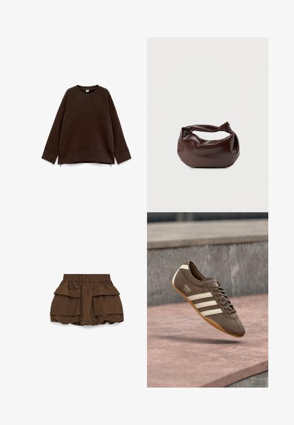 Sweatshirt long à manches longues marron foncé avec un col rond, des épaules tombantes, des poignets larges et de petites fermetures éclair sur les côtés à l'ourlet.; Shorts marron taille haute avec ceinture élastique et grandes poches avant superposées de chaque côté, en tissu léger.; Baskets en daim marron avec des rayures blanches et un logo, dotées d'un bout rond et d'une semelle en caoutchouc gomme, suspendues au-dessus d'une surface texturée.; Sac bandoulière en cuir marron foncé avec une forme souple et décontractée et une anse nouée torsadée sur un fond blanc uni.