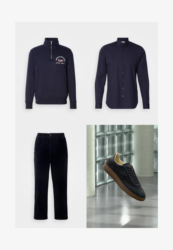 Dunkelblaues Sweatshirt mit hohem Kragen, halbem Reißverschluss, gerippten Bündchen und Saum, mit weißem Text "American Sportswear GANT."; Dunkelblaue Button-Down-Bluse mit langen Ärmeln, klassischem Kragen und schlanker Passform. Aus glattem Stoff mit einem dezenten Logo auf der Brust.; Dunkelblaue Cordhosen mit geradem Bein, ausgestattet mit einem Knopfverschluss und einer subtilen vertikalen Rippstruktur.; Marineblauer Wildleder-Sneaker mit brauner Sohle und schwarzen Schnürsenkeln, gebrandet mit "GANT", schwebt im Innenraum nahe einer Glasbausteinwand und Betonpfeilern.