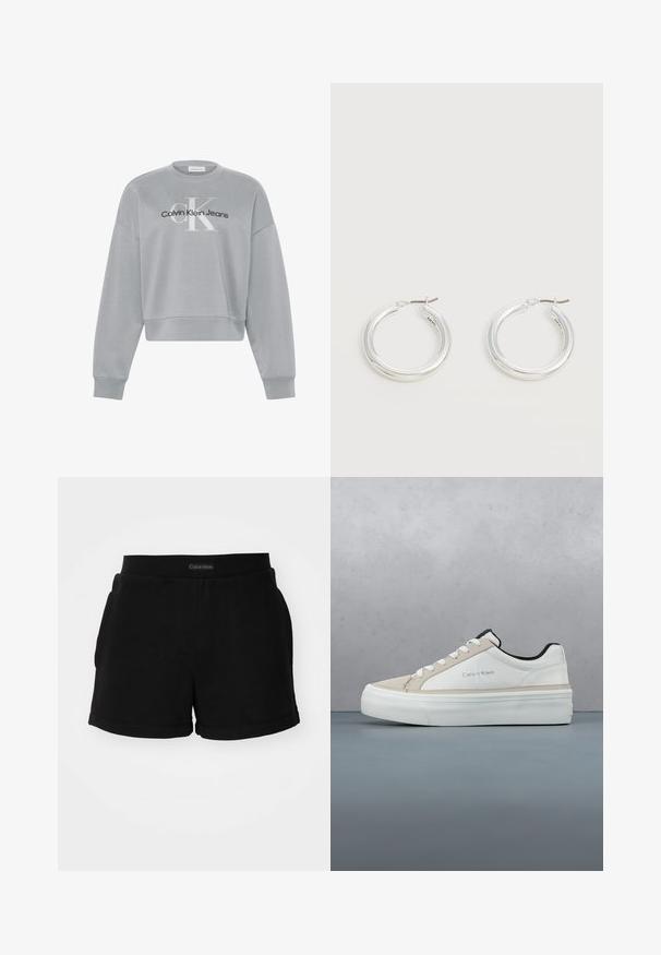 Helehall hall kraega lõikega dressipluus pikkade varrukatega, mille ees keskel on valge "cK" ja must "Calvin Klein Jeans" logo.; Mustad mustrits, millel on ribiga vöökoht, küljetaskud ja ümar hem. Logo on vöökoht.; Valge Calvin Kleini toss, millel on must sisemine vooder ja valged paelad, hõljub plaaditud puidust ja kruusast pinnal õues.; Keskmise suurusega läikivad hõbedased rõngakujulised kõrvarõngad õhukeste metallist kinnitustega heledal neutraalsel taustal.