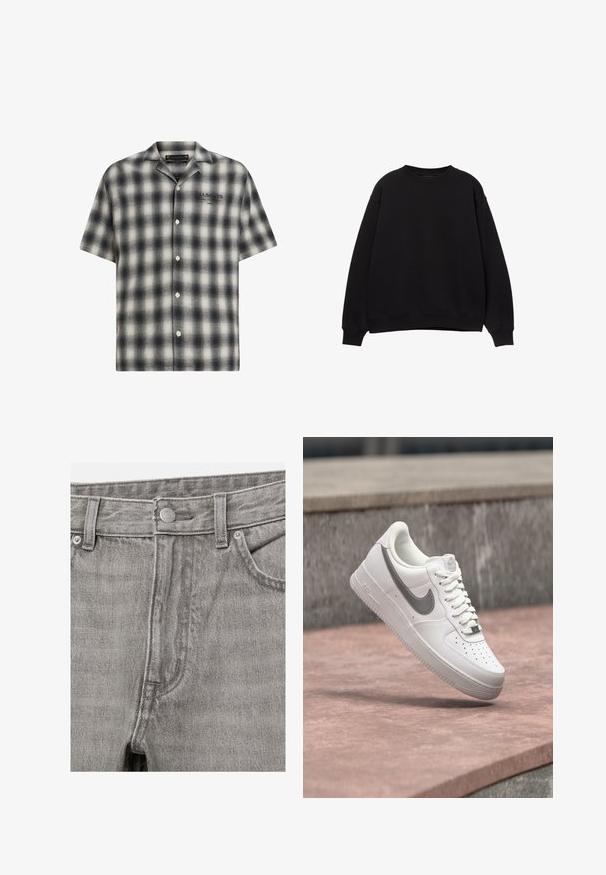 Sweat-shirt noir avec un col rond, des épaules tombantes et des poignets côtelés. Fabriqué en matériau doux, il présente un design simple et classique.; Chemise à manches courtes à carreaux noirs et blancs, avec un devant boutonné. Présente une coupe décontractée, une texture douce et un logo de la marque sur la poitrine.; Jean en denim gris à l'avant avec fermeture par boutons, passants pour ceinture et poches avant visibles.; Baskets blanches Nike Air Force 1 avec logo swoosh gris flottant au-dessus d'une surface en pierre et un mur en pierre gris en arrière-plan.