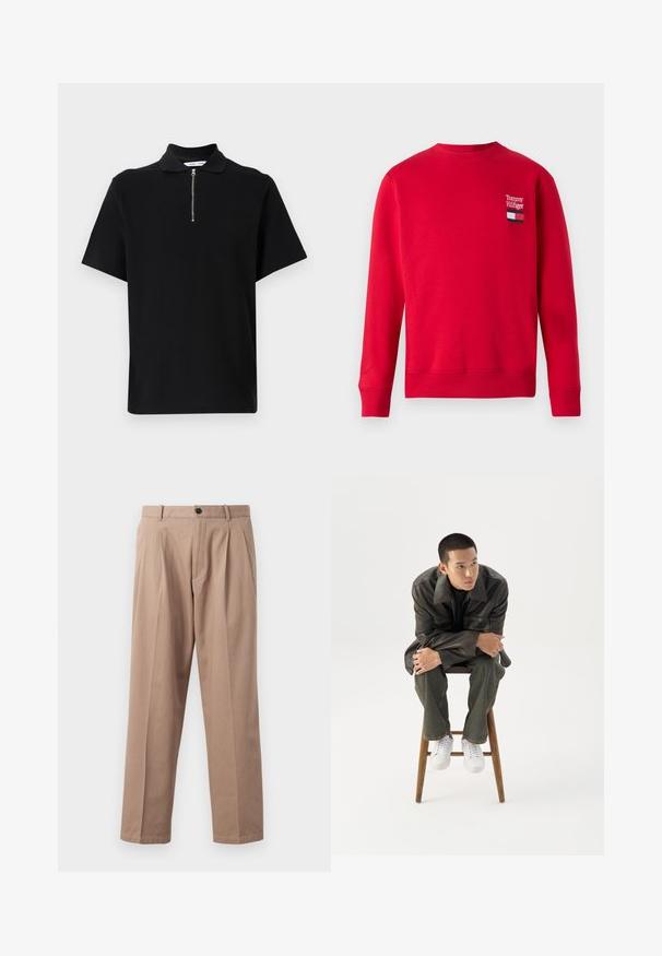 Sweatshirt rouge avec un col ras du cou, des poignets et un ourlet côtelés. Présente un logo "Tommy Hilfiger" brodé et un emblème de drapeau sur la poitrine.; Polo noir à manches courtes en tissu doux, avec un col zippé et un design épuré et minimaliste sans motifs supplémentaires.; Pantalon beige en coton, à coupe droite, avec plis à l'avant, fermeture à bouton et poches latérales. Texture lisse.; Jeune homme en veste en cuir foncée et jean, assis sur un tabouret en bois, penché en avant, les bras croisés, regardant sur le côté sur fond blanc.