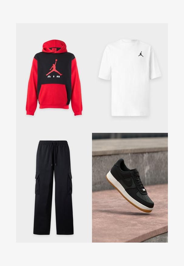 Sweat à capuche rouge et noir avec une poche kangourou et un grand logo Jumpman rouge ainsi que le texte « AIR » sur la poitrine.; T-shirt en coton blanc avec un col rond et des manches courtes. Il présente un petit logo Jordan noir sur la poitrine gauche.; Pantalon cargo noir à jambes larges avec taille élastique et cordon de serrage, avec des poches à rabat sur les deux cuisses.; Baskets basses noires avec semelle intermédiaire blanche, semelle extérieure en gomme, et logo Nike swoosh, flottant au-dessus d'une surface en béton rose avec un mur en pierre en arrière-plan.