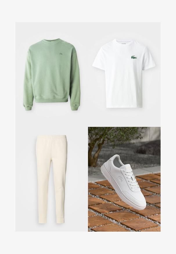 Hellgrüner Rundhalsausschnitt-Pullover mit langen Ärmeln und kleinem gesticktem Krokodil-Logo auf der linken Brust.; Lacoste T-Shirt print - white/green; Cremfarbene Sweatpants aus weichem Stoff, mit einem elastischen Taillenbund, schmal zulaufenden Beinen und Bündchen an den Knöcheln. Einfaches Design ohne Muster.; Weißer Lacoste-Sneaker mit Schnürsenkeln, der über quadratischen Holzkacheln und kleinen grauen Kieselsteinen schwebt, unscharfer Baum und Wand im Hintergrund.