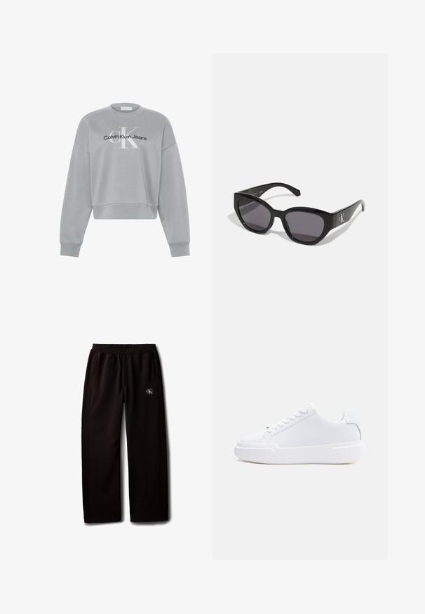Lysegrå cropped sweatshirt med lange ærmer, der har hvid "cK" og sort "Calvin Klein Jeans" logo centreret på forsiden.; Sorte vidde bukser med elastisk taljebånd og sidelommer, med en lille Calvin Klein-logo patch på højre lår.; Hvid lavtop-sneaker med snørelukning, tyk sål og glat overdel, vist fra ydersiden mod en ensartet lys baggrund.; Sorte solbriller med et strømlinet, vinklet design, mørke linser og et kontrasterende sølvlogo på siden. Glat plastoverflade.