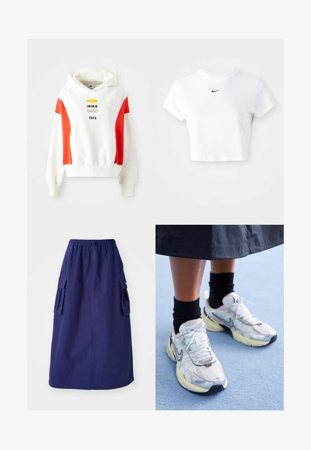 Sudadera blanca con acentos rojos, capucha con cordón y gráfico frontal. Presenta un logo y texto en el pecho. Tejido suave, puños y dobladillo de canalé.; Camiseta corta blanca de algodón, con mangas cortas y cuello redondo, y un logo negro de Nike en el pecho.; Falda azul marino de longitud media con una cinturilla elástica, que presenta dos bolsillos laterales tipo cargo y un detalle de logotipo minimalista. Textura de tela suave.; Zapatillas Nike blancas y plateadas con tejido de malla, detalles reflectantes y una suela beige. Llevadas con calcetines negros, de pie sobre una superficie azul.