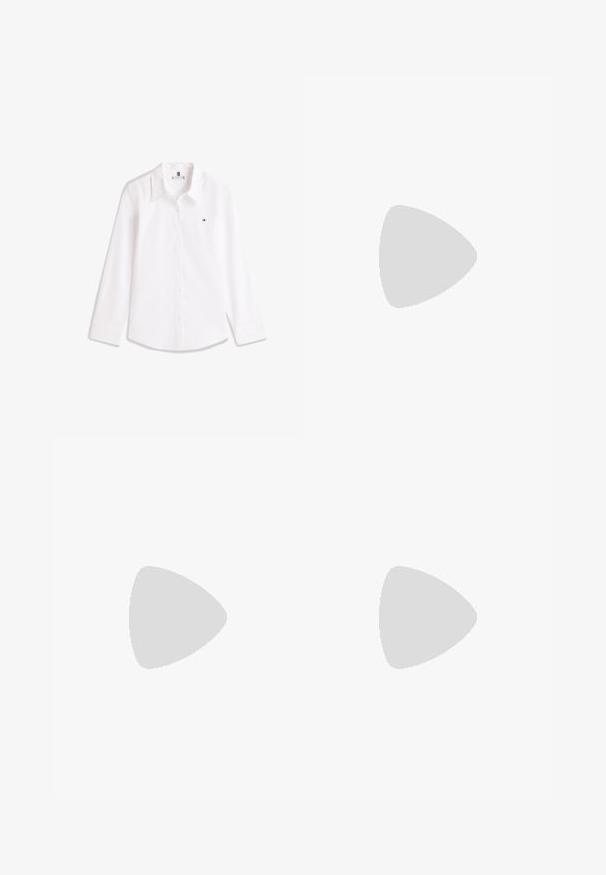 Camisa blanca de manga larga con botones, cuello y pequeño logotipo bordado en el pecho izquierdo.; Pantalones de vestir grises con un diseño de pierna recta, textura suave, cierre frontal con botón y dobladillos zurcidos para un aspecto ajustado.; Bota holgada de ante marrón oscuro hasta la mitad de la pantorrilla con puntera redonda, tacón bajo, suela negra y cinta en la parte trasera.; Bolso tote de ante marrón con correas anchas y costuras sencillas, de pie sobre un fondo claro y liso.