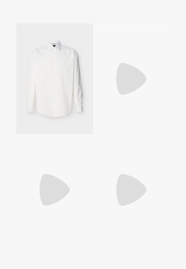 Camisa blanca de manga larga con botones, con sutiles rayas verticales y cuello puntiagudo, mostrada plana sobre un fondo claro.; Pantalones ajustados en suave tejido texturizado de color verde claro. Cuentan con un cierre de botón único y bolsillos laterales inclinados. Acabado liso en toda su superficie.; Zapato tipo mocasín de cuero negro descansando sobre una alfombra beige con una mesa circular marrón brillante al fondo.; Corbata de seda azul con rayas diagonales en tonos azul claro y oscuro. Presenta un pequeño diseño floral bordado cerca de la punta.