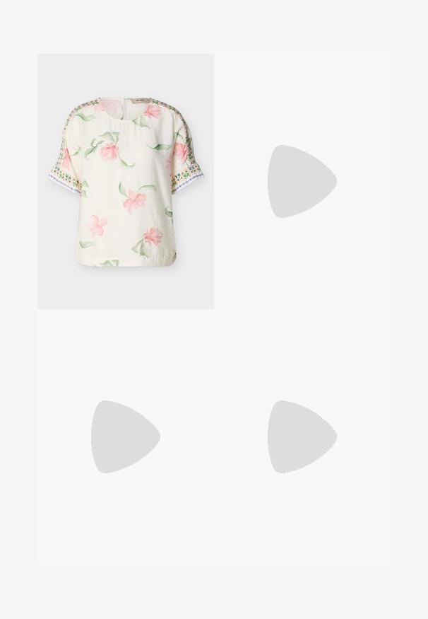 Blouse courte à manches courtes crème avec imprimé floral rose et feuilles vertes, ornée de motifs décoratifs en bordure verte et bleue sur les manches.; Pantalon beige en coton avec jambes droites, fermeture à bouton sur le devant et texture lisse. Comprend des passants de ceinture standard et un design à l'avant plat.; Chaussure de ballet pour femme en daim marron plat, avec bout rond et talon bas, vue de profil gauche sur fond blanc.; Sac cabas vert olive avec double poignées et une écharpe à motif floral attachée à une poignée.