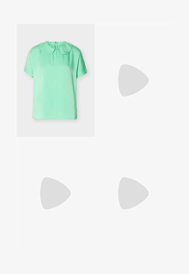 Blouse à manches courtes vert menthe avec col rond Peter Pan et fermeture à boutons au dos, présentée sur un fond blanc.; Jupe en cuir noir avec une forme structurée, dotée d'une poche avant et d'un accent métallique à la taille. Texture lisse et détails de couture.; Bottine en cuir noir à bout pointu et petit talon kitten, présentée en angle devant un sol poli et un mur en blocs de verre.; Sac bandoulière rectangulaire en cuir noir avec bandoulière ajustable, fermeture éclair sur le dessus et petit logo Calvin Klein doré sur le devant.