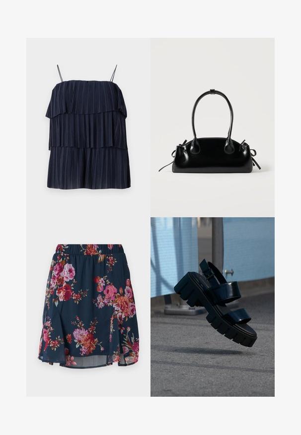 Marineblauw geplooid top met gelaagd ontwerp, dunne bandjes en zachte textuur. Elke laag heeft verticale plooien, waardoor diepte en beweging ontstaan.; Floral skirt in marineblauwe stof met roze, rode en oranje bloemen. Heeft een elastische tailleband en een uitlopende design met zijsplitten.; Zwarte chunky platform sandaal met twee banden en gesp, zwevend in de lucht boven grijze bestrating en een blauwe stoffen achtergrond.; Kleine zwarte glanzende handtas met twee lange hengsels en zijkant trekkoord details op een effen lichte achtergrond.