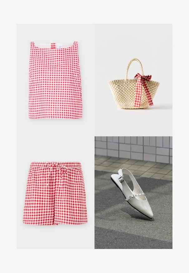 Haut sans manches à motifs vichy rouges et blancs avec encolure carrée et petite boucle en tissu au centre devant.; Shorts à carreaux rouges et blancs avec une taille élastique et un cordon de serrage. Présentent une coupe décontractée et des bords ourlés. Le tissu semble léger.; Chaussure plate slingback blanche pointue avec deux boucles argentées, présentée en extérieur sur un sol texturé et un mur carrelé en arrière-plan.; Sac cabas en paille tissée avec des poignées tressées et un ruban à carreaux rouge et blanc noué en un nœud d'un côté.