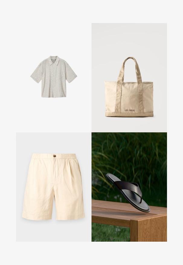 Overhemd met korte mouwen en knopen, lichtbeige en off-white luipaardprint met een borstzak.; Beige casual shorts met elastische tailleband, enkele knoopsluiting, zijzakken en een losse pasvorm, geschikt voor warm weer.; Zwarte leren teenslipper zwevend boven een houten bankje met groene bladeren op de wazige achtergrond.; Beige canvas tas met twee handvatten en een voorvak, "LES DEUX" geborduurd op het vak.