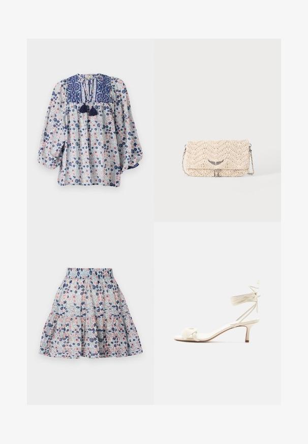 Blouse à motif floral en bleu, blanc et rose avec un décolleté fendu, des détails à franges et des manches longues volumineuses. Tissu en coton.; Jupe à imprimé floral en bleu clair, ornée de fleurs roses et marines. Design en volants avec une taille élastique et un tissu doux et texturé.; Sandale à talon bas de couleur crème avec des liens à nouer autour de la cheville et une large bride torsadée sur les orteils, sur un fond blanc uni.; Pochette tissée beige avec rabat, bandoulière chaîne en métal et petite décoration argentée en forme d'aile à l'avant.