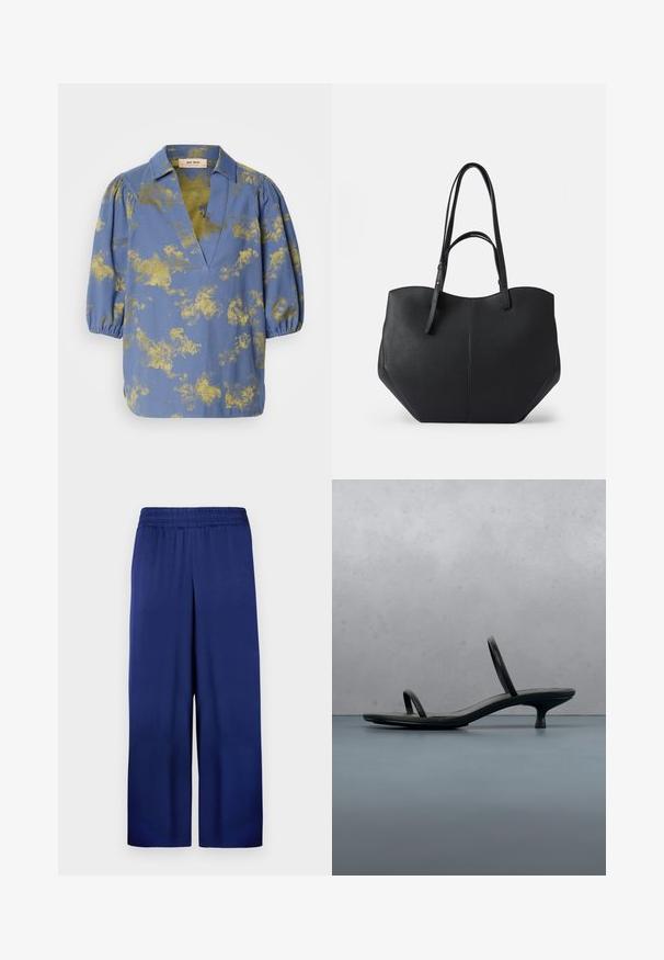 Blaue Bluse mit goldenem abstraktem Muster, Kragen und Puffärmeln. Hergestellt aus glattem Stoff mit lockerer Passform und V-Ausschnitt.; Marineblaue weite Hose mit elastischem Bund, aus glattem Stoff gefertigt, mit einem schlichten und funktionalen Design ohne sichtbare Muster.; Schwarze Calvin Klein Sandalette mit dünnen Riemen und Absatz, balanciert auf Holzfliesen im Freien neben einer Wand und Grünpflanzen.; Schwarze Tragetasche aus glattem, strukturiertem Leder, mit abgerundetem oberen Teil und zwei langen Griffen. Verfügt über eine winklige Basis für Stabilität und ein strukturiertes Design.