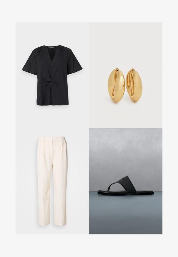 Musta paita V-kaula-aukolla, lyhyillä hihoilla ja solmittavalla vyötäröllä. Hihoissa on teksturoitua, kuviollista kangasta ja vartalossa sileä pinta.; Lacoste Housut - lapland; Mustat Calvin Klein -verkkosandaalit kellumassa puisilla lankuilla, pienillä kivillä ulkona, taustalla epätarkka vihreä kasvillisuus ja betoniseinä.; Pari kiillotettuja kullankeltaisia paksuja rengaskorvakoruja, joissa on hieman soikea, tanakka muotoilu ja saranakiinnitys valkoisella taustalla.