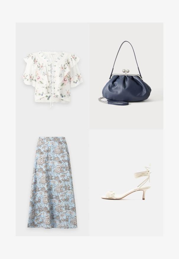 Blouse blanche avec broderie florale, larges manches à volants, encolure festonnée et détail lacé sur le devant.; Jupe trapèze bleu clair avec imprimé tropical de palmiers et de fleurs marron et blanc, longueur genou, avec une ceinture lisse.; Sandale à talon bas de couleur crème avec des liens à nouer autour de la cheville et une large bride torsadée sur les orteils, sur un fond blanc uni.; Sac à main en cuir bleu marine doux avec fermeture à boucle argentée, une seule bandoulière, et une chaîne de poignet amovible sur fond blanc.