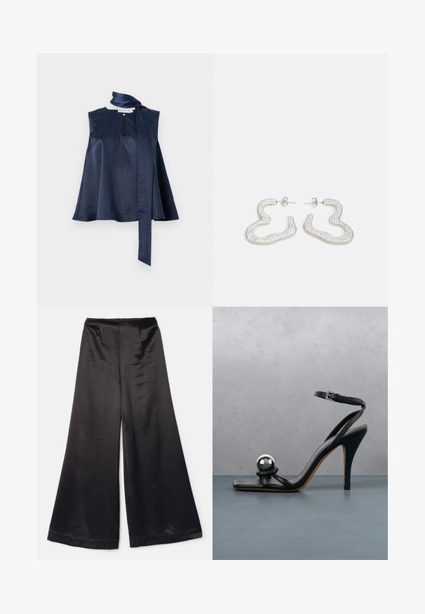 Top sans manches en satin marine avec un détail en trou de serrure, un design fluide et un long noeud en écharpe au niveau du cou, avec une texture lisse et une belle drapé.; Pantalon large noir en tissu satiné et lisse. Doté d'une taille élastique haute et d'un design minimaliste sans fermetures visibles.; Sandale noire à talon haut avec bride à la cheville et boule décorative argentée métallique sur surface carrelée en bois à l'extérieur, avec un arrière-plan flou de verdure et de mur.; Boucles d'oreilles en métal argenté au design abstrait et ondulé, ornées de petits cristaux scintillants. Fermeture arrière à clou sécurisée.