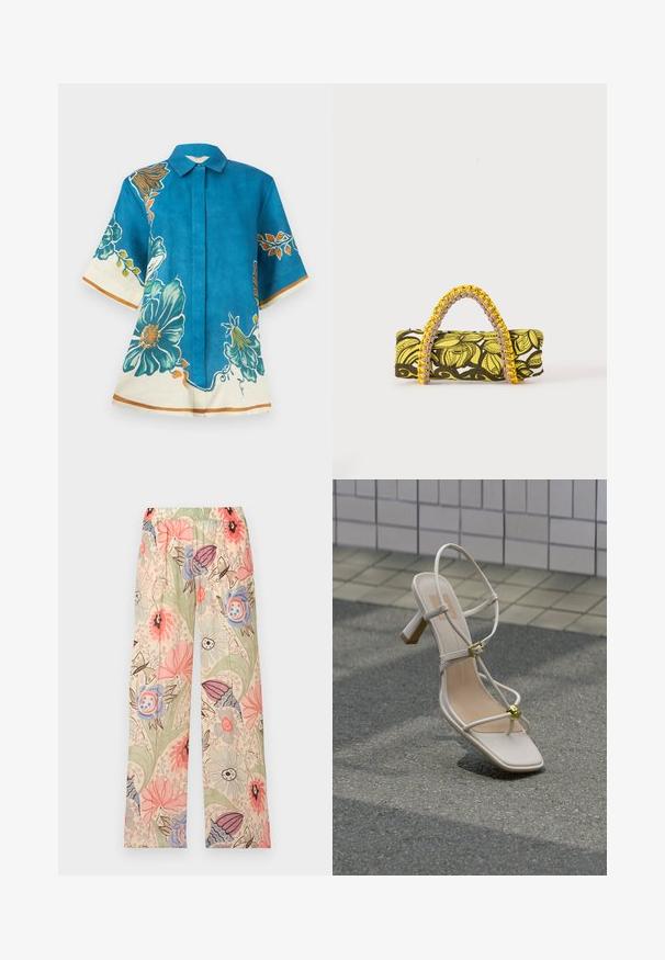Blouse bleu à manches courtes avec de grands imprimés floraux bleu sarcelle et orange, bordures crème aux manches et à l'ourlet, devant boutonné et col pointu.; Pantalon à jambes larges avec une ceinture élastique, présentant un imprimé floral pastel et papillons dans des tons rose, bleu, vert et beige.; Sandale beige à talon avec lanières, boucle dorée et boule décorative dorée sur sol pavé près d'un mur carrelé.; Sac rectangulaire avec motif floral jaune et noir et anse tressée jaune et rose sur fond blanc.
