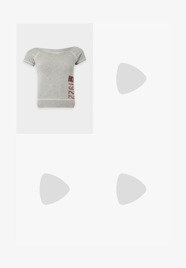 Light gray short-sleeve shirt with wide neckline and red "HCO 1922" text printed vertically on the lower right side.; Dark blue denim mini skirt with front button, zipper, belt loops, front and back pockets, and subtle faded details, lying flat on a white background.; Black suede and leather sneaker with a cream side swoosh and light cream heel. Features beige laces and a gum rubber outsole.; Black leather shoulder bag with a buckle strap detail, curved edges, and contrasting white stitching on a plain background.