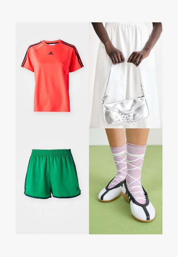 Camiseta deportiva de manga corta en un brillante color coral, fabricada con un tejido ligero. Presenta el logo de Adidas en negro y tres rayas negras en cada hombro.; Pantalones cortos deportivos verdes con una textura suave, cinturilla elástica y acentos laterales en verde oscuro. Presentan el logo de Adidas en el dobladillo inferior.; Piernas con calcetines lavanda acanalados con tiras blancas cruzadas combinados con bailarinas blancas con ribete negro sobre un suelo verde.; Bolso metálico plateado con detalle de cordones, que presenta un diseño elegante y una correa corta. El bolso está sostenido con las manos, mostrando su textura.