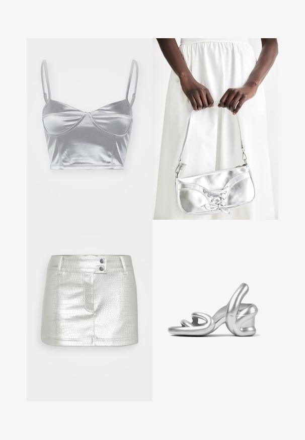 Bralette de satén plateado con tirantes finos ajustables, escote corazón y diseño retorcido en el centro. Textura suave y brillante.; Falda plateada de cuero sintético con un patrón texturizado de cocodrilo, que presenta dos botones azules como acentos y un diseño ajustado.; Sandal de tacón alto plateado con un diseño escultórico, acabado metálico suave y un detalle único de correa retorcida en la parte frontal.; Bolso metálico plateado con detalle de cordones, que presenta un diseño elegante y una correa corta. El bolso está sostenido con las manos, mostrando su textura.
