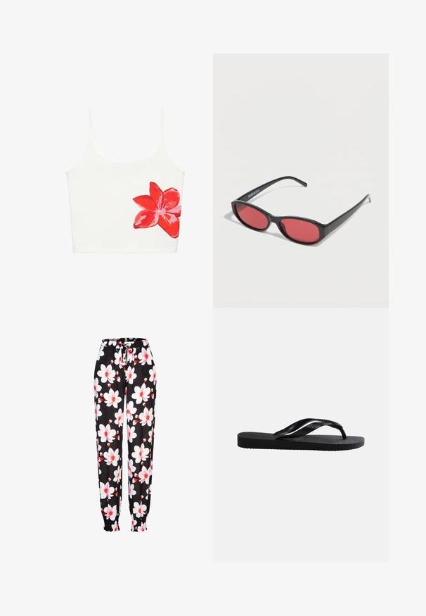 Camisole courte blanche avec fines bretelles et grand motif fleur rouge en bas à droite.; Pantalons en tissu noir avec un motif floral blanc et rouge, taille élastique avec cordon de serrage, et poignets froncés. Matière légère.; Tongs en caoutchouc noir avec semelle texturée et bride en Y lisse sur un fond clair uni.; Lunettes de soleil ovales noires avec des branches fines et des verres teintés rouges posées sur une surface blanche.