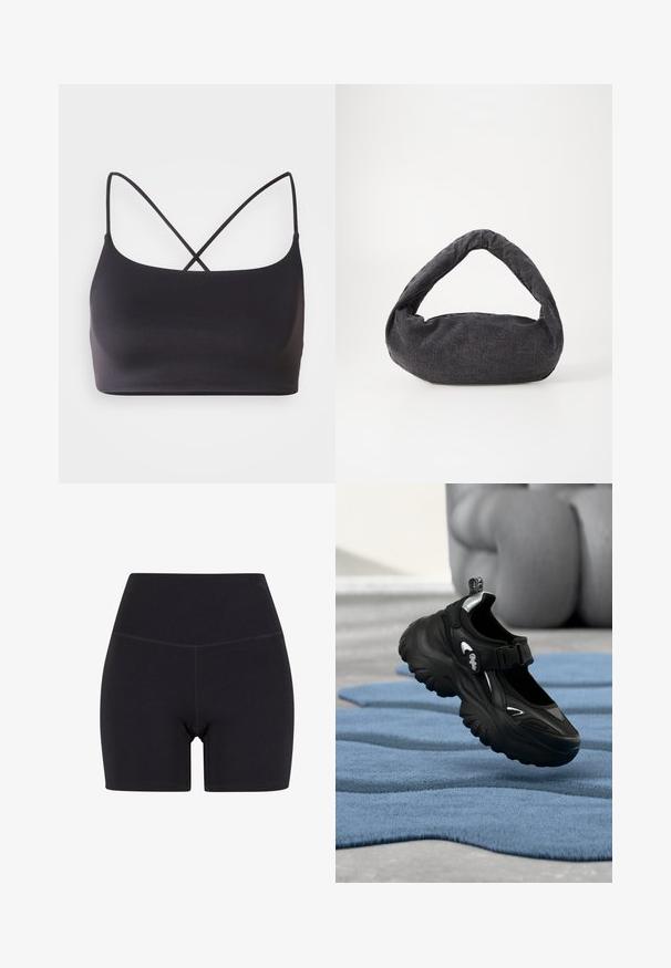 Sort bralette med en glat overflade, der har tynde stropper, som krydser hinanden på ryggen for et minimalistisk design.; Sorte højtaljede shorts lavet af strækbart stof. Har en elastisk talje, glat tekstur og midt på låret længde med et sømløst design.; Sort chunky sneaker med tyk sål og velcrolukning på blåt tekstureret tæppe, sløret baggrund med en siddende person.; Mørkegrå stofpose med et buet håndtag, blød tekstur og rund form. Ingen synligt hardware eller pynt.