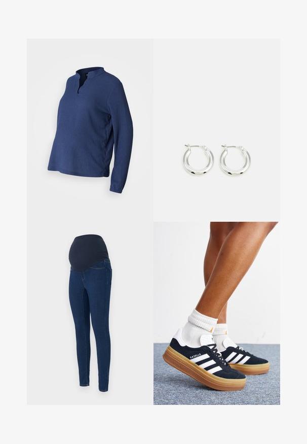 Blå, langærmet top med henley-udskæring, lavet af tekstureret stof. Har en løs pasform og sideslids for komfort og bevægelsesfrihed.; Graviditetsjeans i mørkeblå denim, med en strækbar mørk talje og en tætsiddende pasform med lommer.; Ben iført hvide sokker og sorte Adidas Gazelle sneakers med hvide striber og tykke brune såler på et gråt tæppe.; Sølv hoop-øreringe med en poleret finish, der har en cirkulær form og en hængslet lukning. Glat tekstur med minimal detaljering.