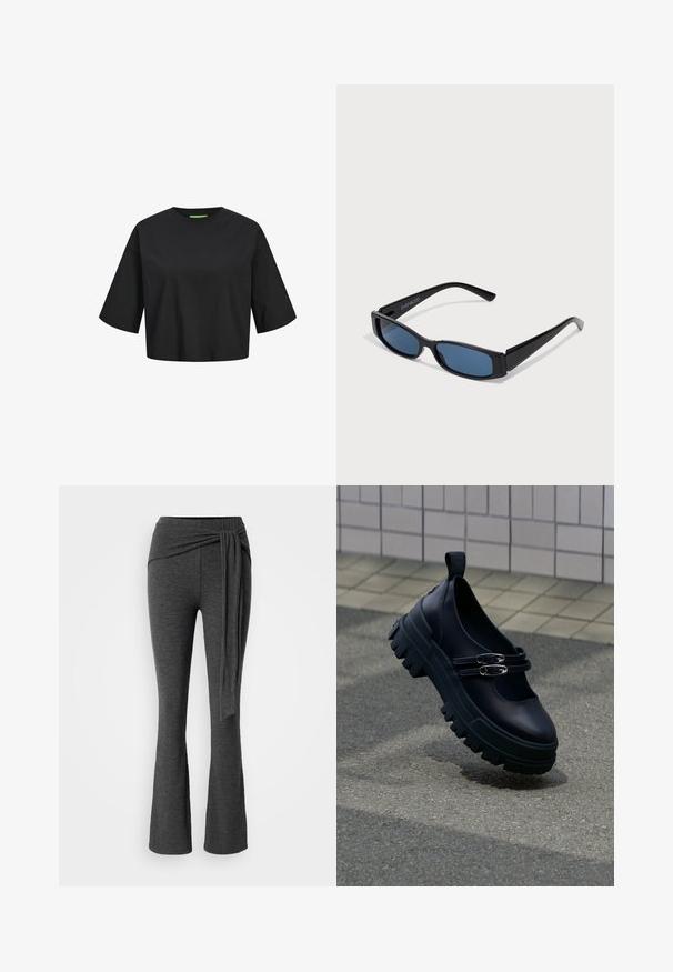 Zwarte katoenen cropped t-shirt met een ronde hals, korte mouwen en een groen labeldetail bij de hals. Glad, zacht textuur.; Grijze flared broek van zachte stof met een brede, gedraaide tailleband en een lange, hangende strikdetail aan de voorkant.; Zwarte chunky Mary Jane-schoen met dubbele zilveren gespsluiting op een gestructureerd trottoir nabij een betegelde muur.; Zwarte zonnebril met een slank rechthoekig frame en blauwe lenzen. Heeft een gladde textuur en stevige pootjes. Merklogo aan de zijkant.