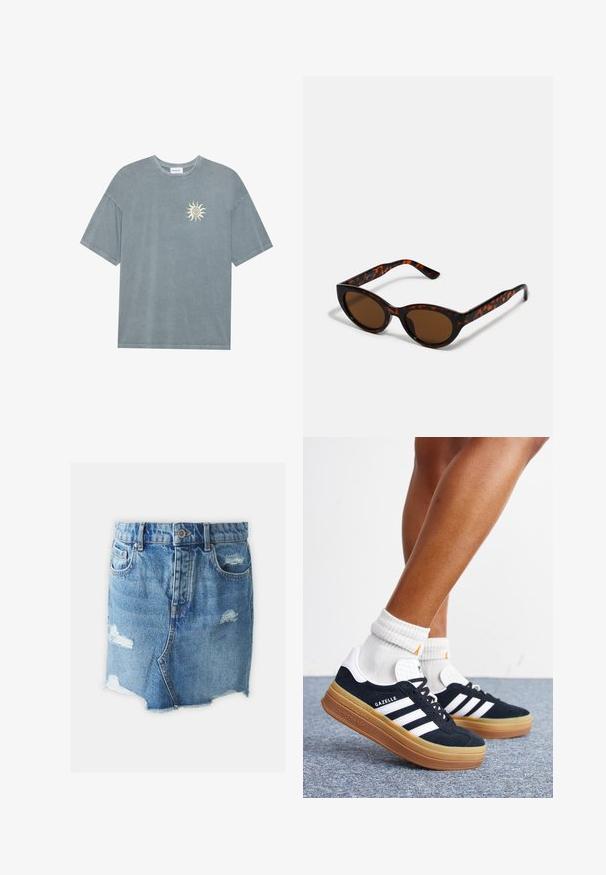 T-shirt surdimensionné bleu clair en coton doux, avec un col rond et un motif de soleil jaune sur le côté gauche de la poitrine.; Jupe en denim mini en bleu clair avec des patchs déchirés, ourlet brut, design traditionnel à 5 poches et fermeture à boutons sur le devant.; Jambes portant des chaussettes blanches et des baskets Adidas Gazelle noires avec des bandes blanches et des semelles épaisses marron sur un sol recouvert de moquette grise.; Lunettes de soleil en écaille de tortue marron avec une forme vintage de lunettes cat-eye et des verres marron. Présente des branches courbées avec des accents rouges.