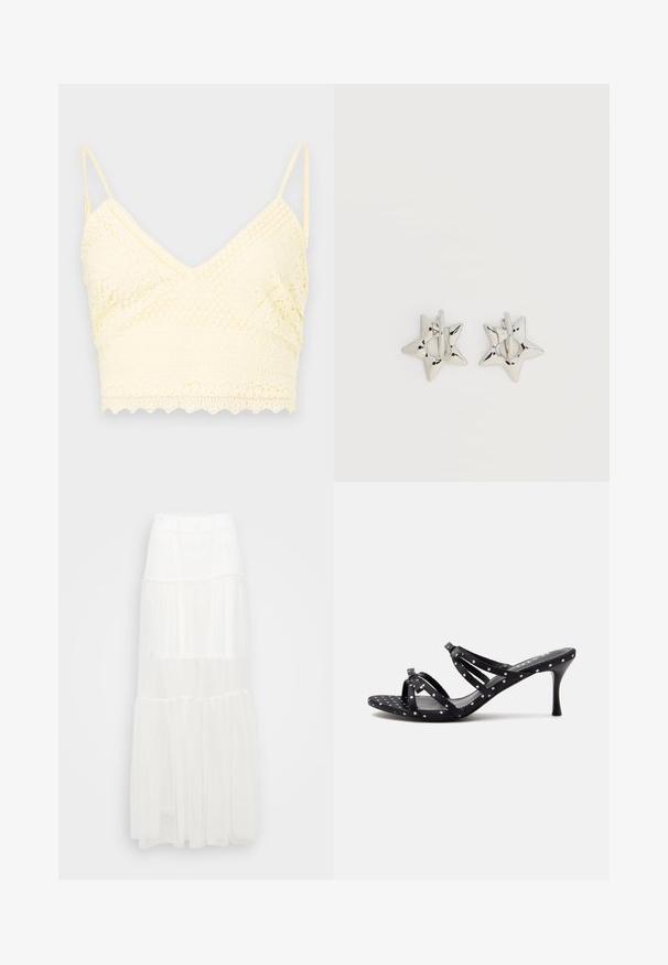 Gul blonde bralette med V-halsdesign, justerbare stropper, teksturerede mønstre og bølget kant.; Hvid lagdelt maxiskørt med elastisk talje. Fremstillet af letvægtsstof, har semi-gennemsigtige lag og et flydende design.; Sort højhælet sandal med hvide polkaprikker, åben tå og tynde krydsstroppper på en ensartet lys baggrund.; Sølv stjerneformede øreringe med en glat, poleret finish på en ensfarvet hvid baggrund.