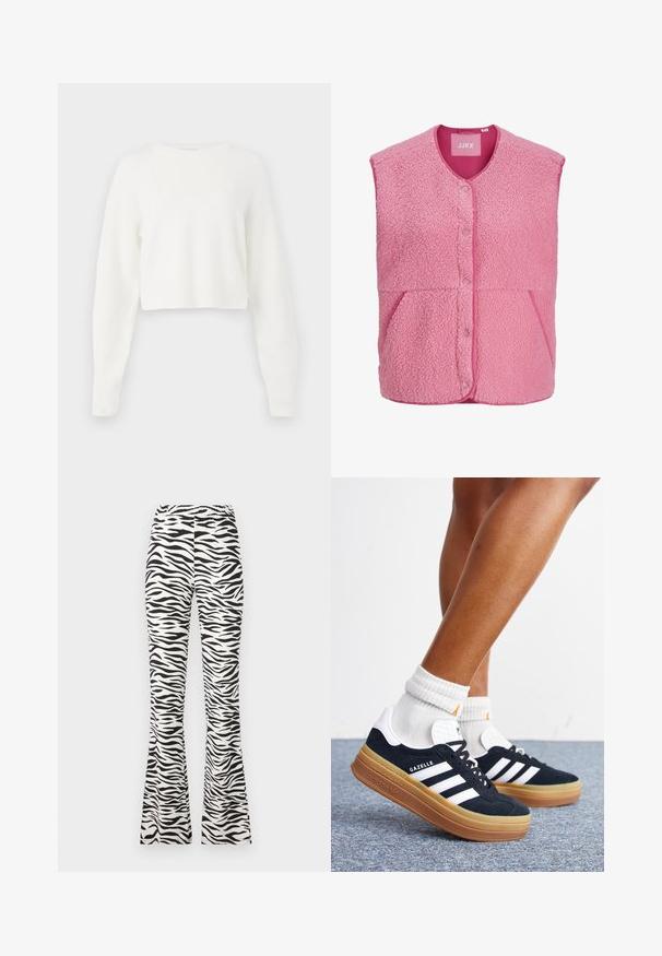 Gilet sans manches en polaire rose avec boutons-pression à l'avant et deux poches avant inclinées, doté d'un col rond.; Pull blanc court avec des manches longues, texture côtelée et col rond. Fabriqué en matériau doux et léger.; Pantalons évasés noir et blanc avec un motif zèbre, fabriqués en tissu léger avec une taille élastique pour plus de confort.; Jambes portant des chaussettes blanches et des baskets Adidas Gazelle noires avec des bandes blanches et des semelles épaisses marron sur un sol recouvert de moquette grise.