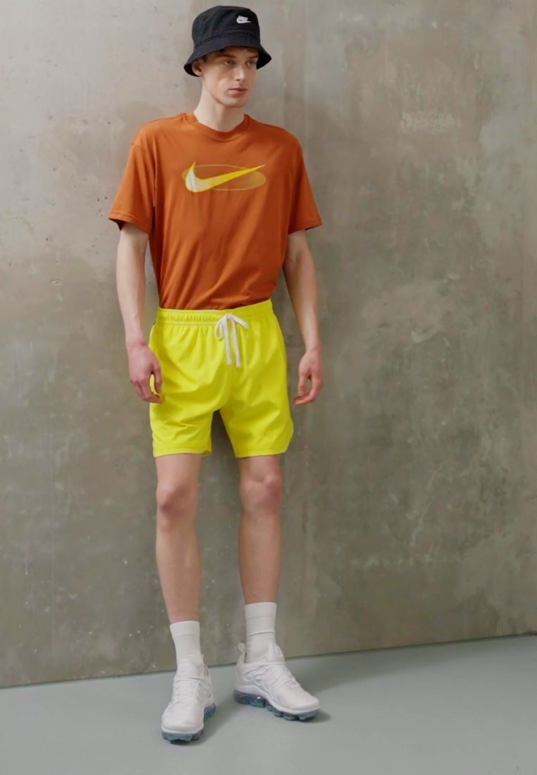 Nike Sportswear CLUB FLOW Tracksuit bottoms opti yellow/white/yellow Zalando.co.uk