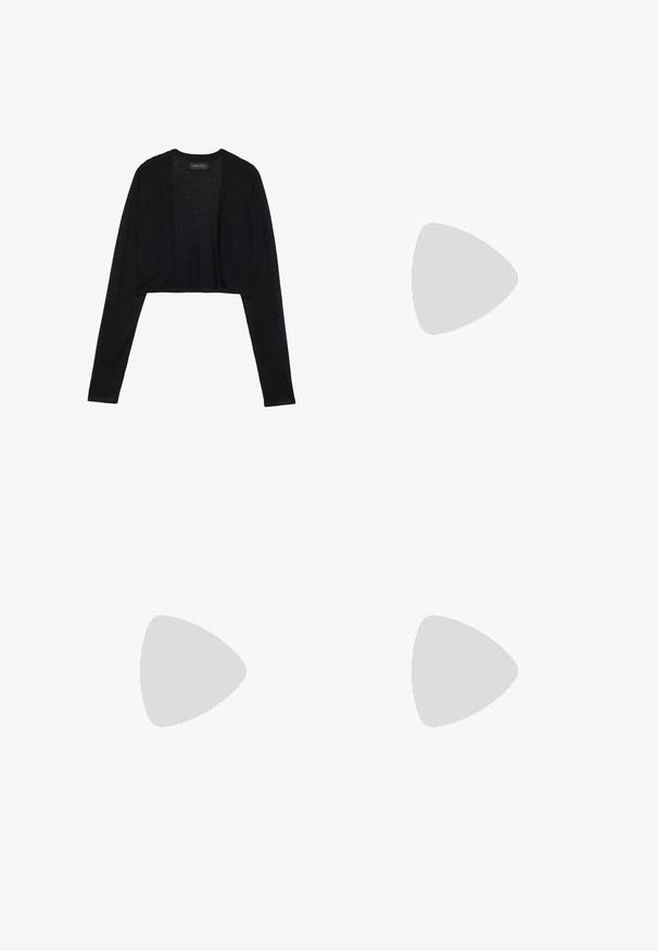 Black cropped cardigan with long sleeves, made of lightweight knit fabric. Features open-front design and rounded edges.; Black and white T-shirts, round neck, short sleeves. Black shirt features yellow sun embroidery; white has purple crescent moon accent.; Navy blue flared leggings made from stretchy fabric with a high waistband, smooth texture, and no visible patterns or hardware details.; White sneakers featuring a mesh material, rubber sole, lace-free design with elastic bands, and gold-toned accents.