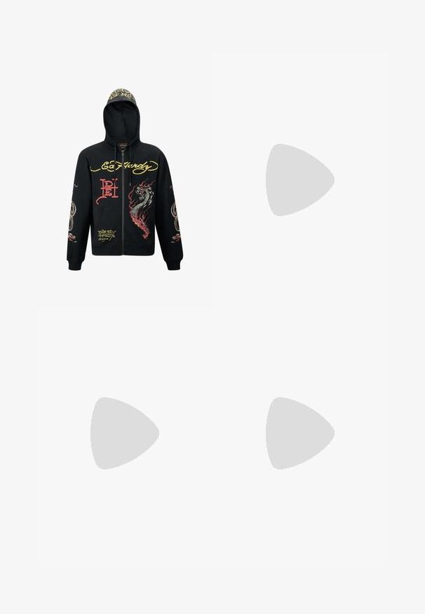 Black zip-up hoodie with a hood, featuring colorful dragon and snake graphics, textured fabric, ribbed cuffs, and logo accents.; White cotton t-shirt with a v-neck and short sleeves. Features a small colorful embroidered logo on the left chest. Soft texture.; Dark blue wide-leg jeans featuring a large white cartoon dog graphic on the back pocket. Denim texture, traditional five-pocket design.; Black suede sneakers with white rubber soles and side stripes, paired with light green cargo pants, standing on a textured dark surface.